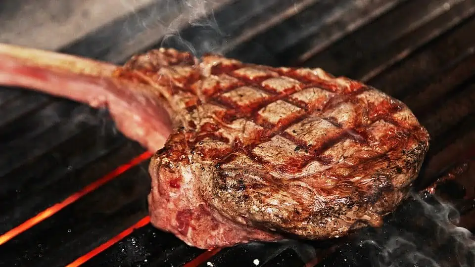 A sizzling tomahawk steak.